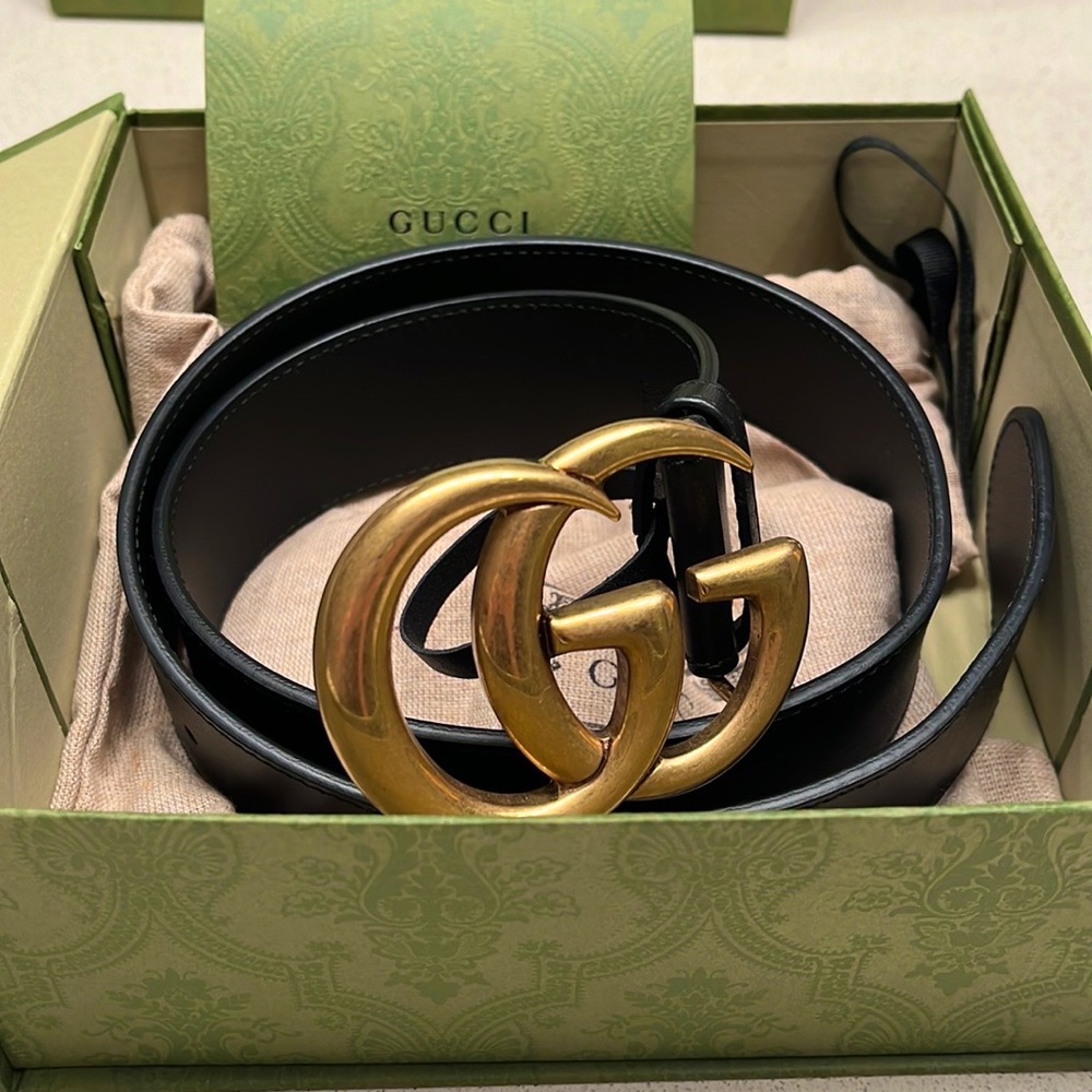 Authentic Gucci black leather women’s belt with gold buckle.Size small. Like new